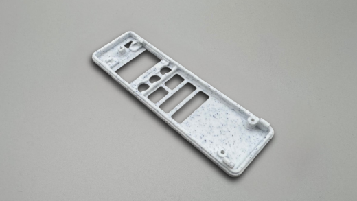 Top shell view showing component slots and openings